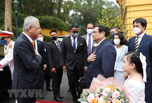 政府总理范明正主持仪式欢迎马来西亚总理伊斯梅尔•萨布里•雅各布访越（组图）