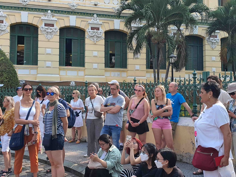 International tourists busy exploring HCM City