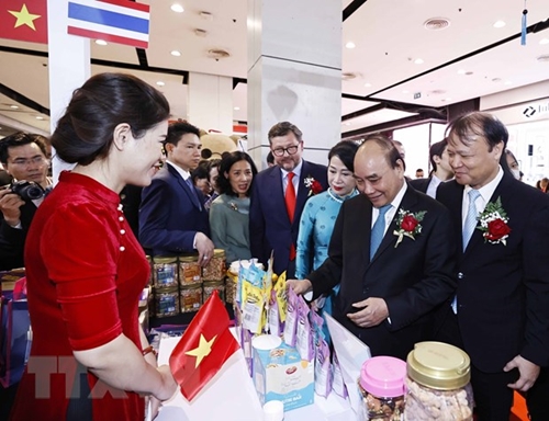 Le président Nguyên Xuân Phuc inaugure la Semaine des produits vietnamiens en Thaïlande 2022