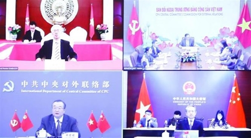 越共中央对外部部长与中共中央对外联络部部长举行视频会谈
