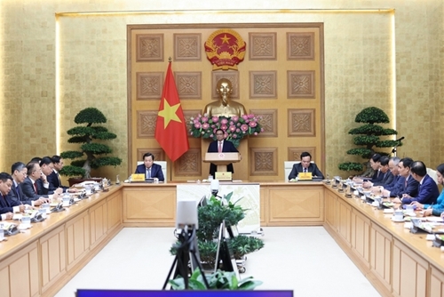 范明正总理会见越南新任驻外使节代表团