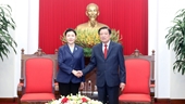 Заведующий Отделом ЦК КПВ по внутренним делам Фан Динь Чак принял Министра юстиции Китая Хэ Жун