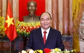 El presidente Nguyen Xuan Phuc felicita a su homólogo chino por la celebración de los Juegos Olímpicos