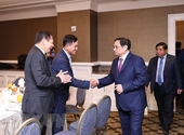 El primer ministro recibe a vietnamitas en el extranjero, empresarios estadounidenses y académicos