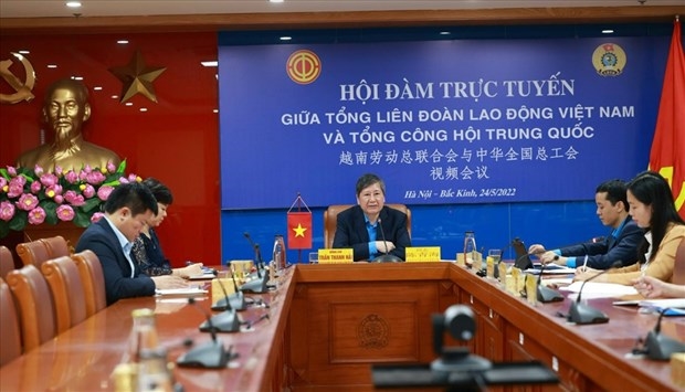 Vietnam y China intercambian experiencias en actividades sindicales
