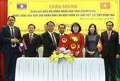 Provincia vietnamita de Dong Nai y laosiana de Champasak intercambian experiencia en actividades de consejos populares