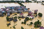 Líderes vietnamitas comparten pérdidas causadas por las lluvias e inundaciones en China