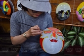 Historia del pintor de máscaras en antigua ciudad de Hoi An
